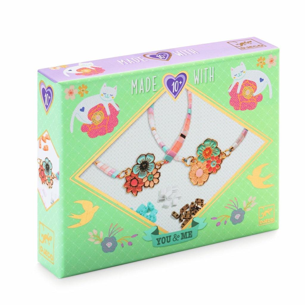 Image of the packaging for the Tila & Flowers Beads and Jewelry craft kit. On the front of the box is a picture of what the completed craft could look like.