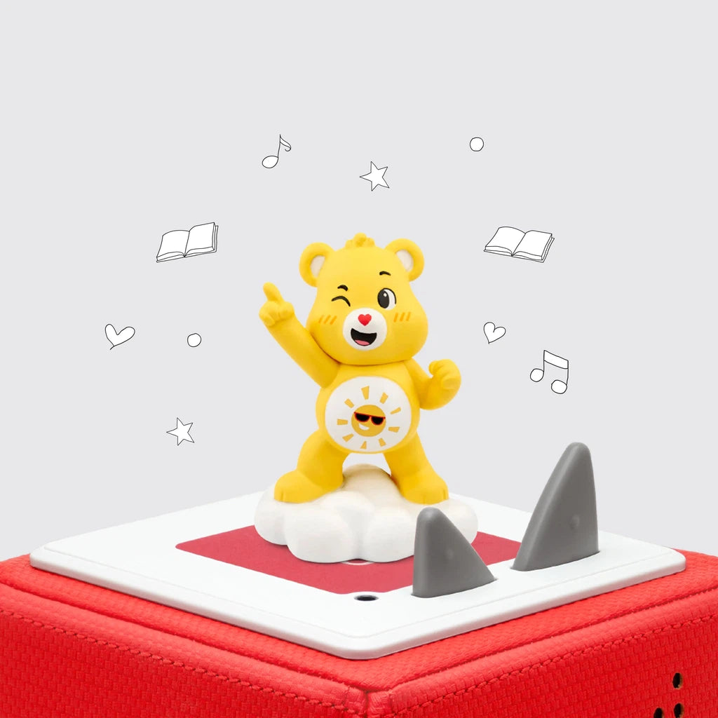 Funshine, the Care Bears hero, sits on a red box.