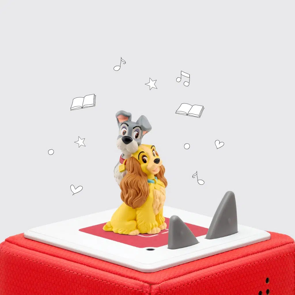 Tonie figure is shown on a toniebox. The figure is the two dogs from the animated "lady and the tramp". 