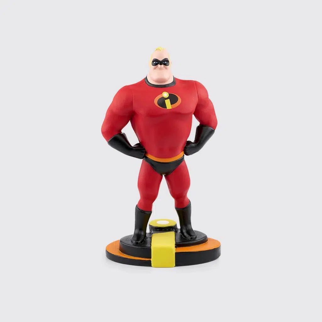 Tonie figure is mr incredible, a buff man in a red super suit and a black eye mask