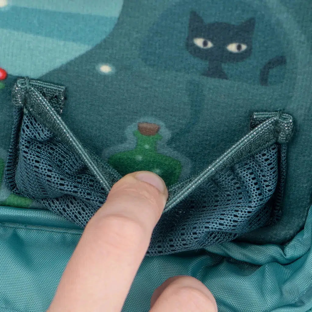 pockets contain hidden images such as one which shows a green bubbling potion bottle behind one pocket