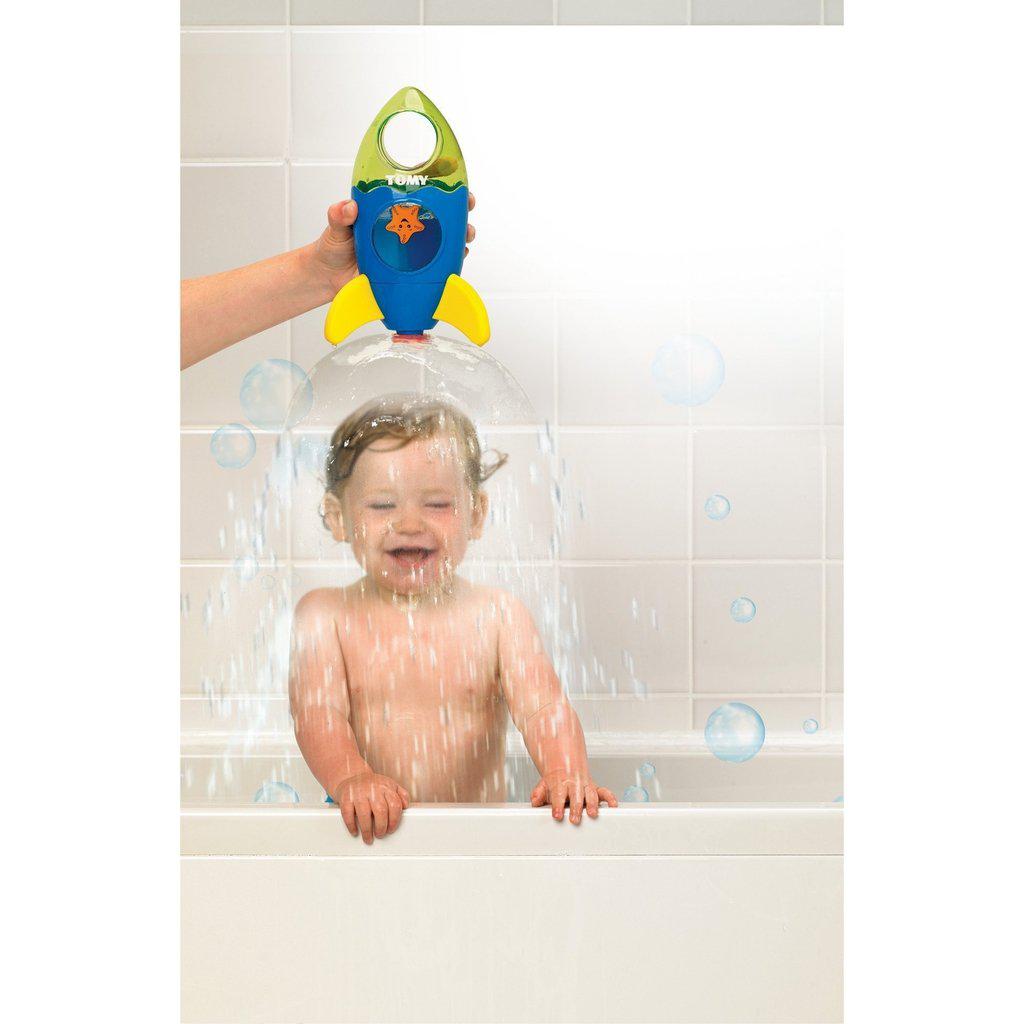 Scene of the Fountain rocket being used in the bath. It creates a conic shower that goes around the child.