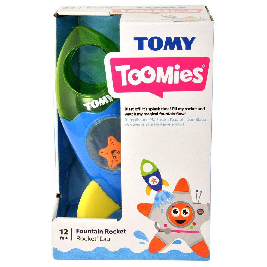 Image of the packaging for the Toomies Fountain Rocket. Part of the front is cut away so you can see and touch the toy inside.