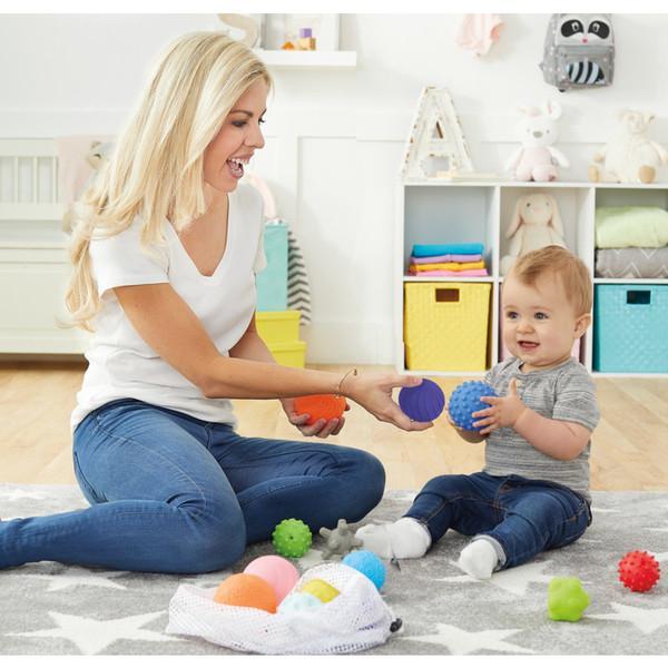 Scene of a mother and a child playing with the toy.