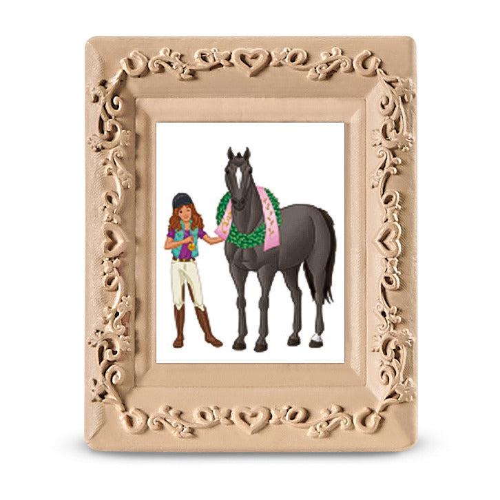 Close up of the picture frame. The picture inside is of a horse with a winners ribbon next to its rider.