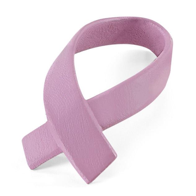 Close up of the winners ribbon. It is pink and is curved to look like it is spreading awareness for breast cancer.