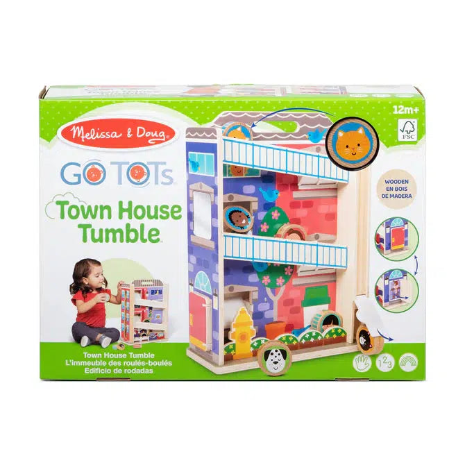 Image of the packaging for the Town House Tumble GO TOTS toy. On the front is a picture of the toy and another picture of a little girl playing with the toy.