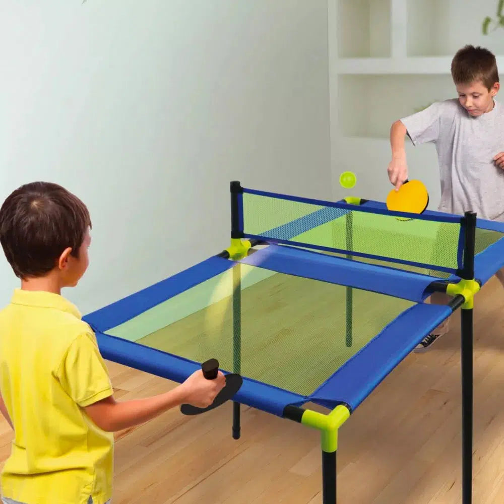 two kids are playing table tennis on the prampoline pong board