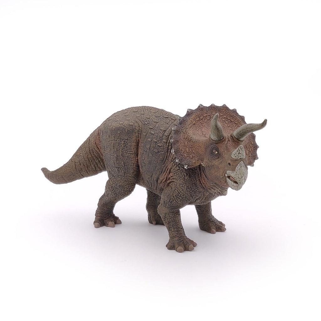 Image of the Triceratops figurine. It is a brown and red dinosaur with a beak, two long horns, and a crown ringed with small horns.