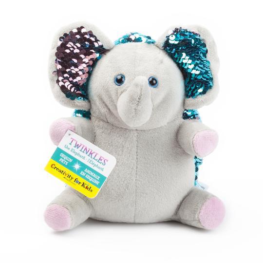 Image of Twinkles the Elephant. He is grey with pink and blue reversible sequins on his ears and back.