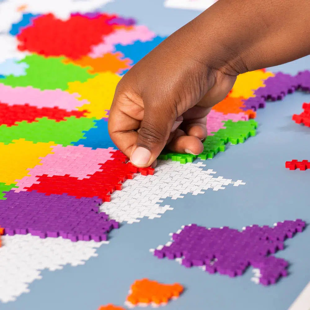 image shows a child creating texas on the puzzle by number. follow the instructions to complete the puzzle