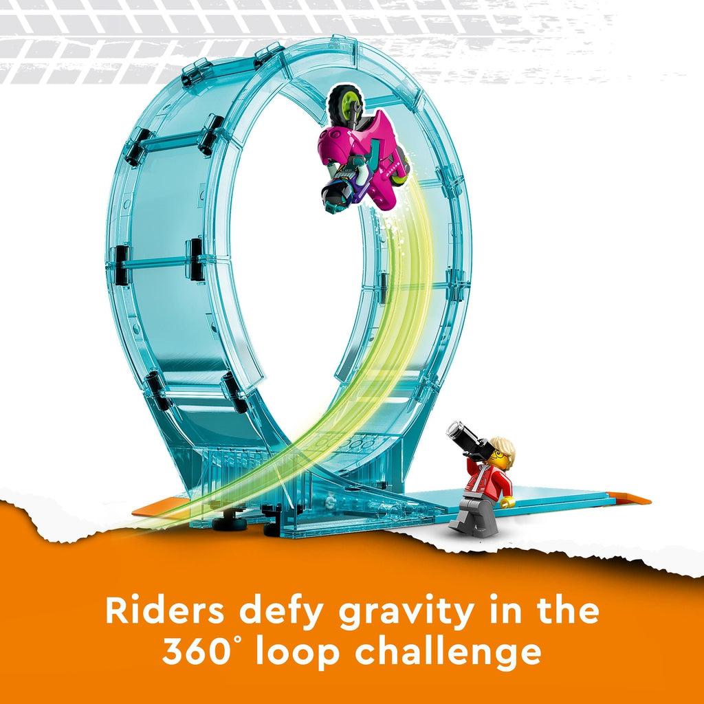 Close up of the loop-de-loop element of the stunt track. Caption: Riders defy gravity in the 360 degree loop challenge