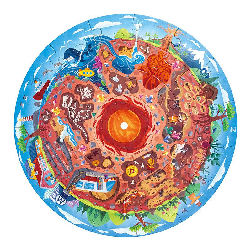 Image of the finished puzzle. It is a circular puzzle of a slice of the world so you can see the above ground world and the underground world. It's all done in a cartoon style.