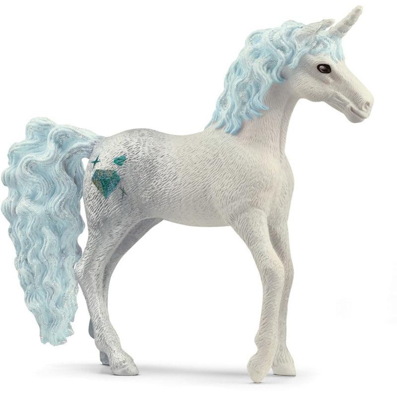 Image of the Unicorn Diamond figurine. It is a white horse with light blue wavy, glittery mane and tail. It has a blue diamond cutie mark.