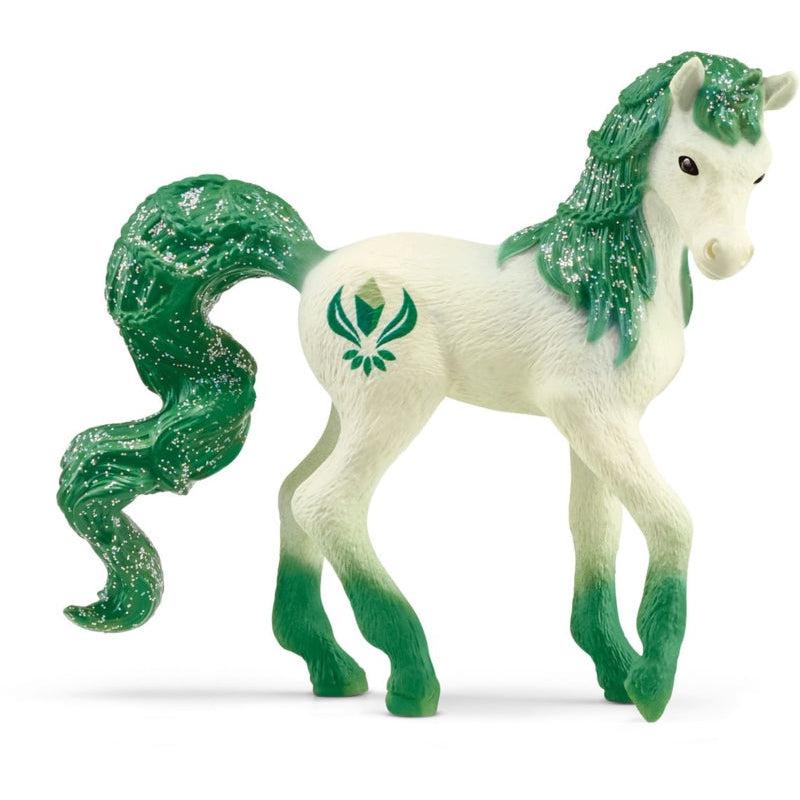 Image of the Unicorn Emerald figurine. It is a white unicorn with long glittery dark green mane and tail. It has green hooves that fade up to the white body. It has a emerald cutie mark.