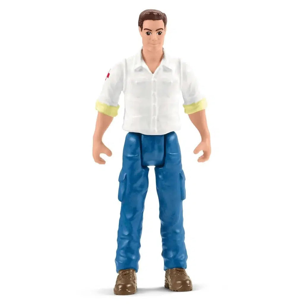 Up close shot of the veterinarian figure. He is wearing a white first aid shirt and blue cargo pants.