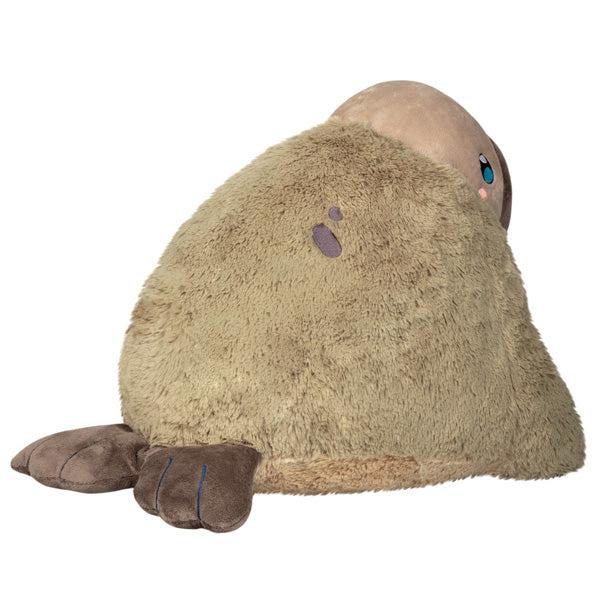 Back view of the plush. Shows that it has brown embroidered spots on the sides.