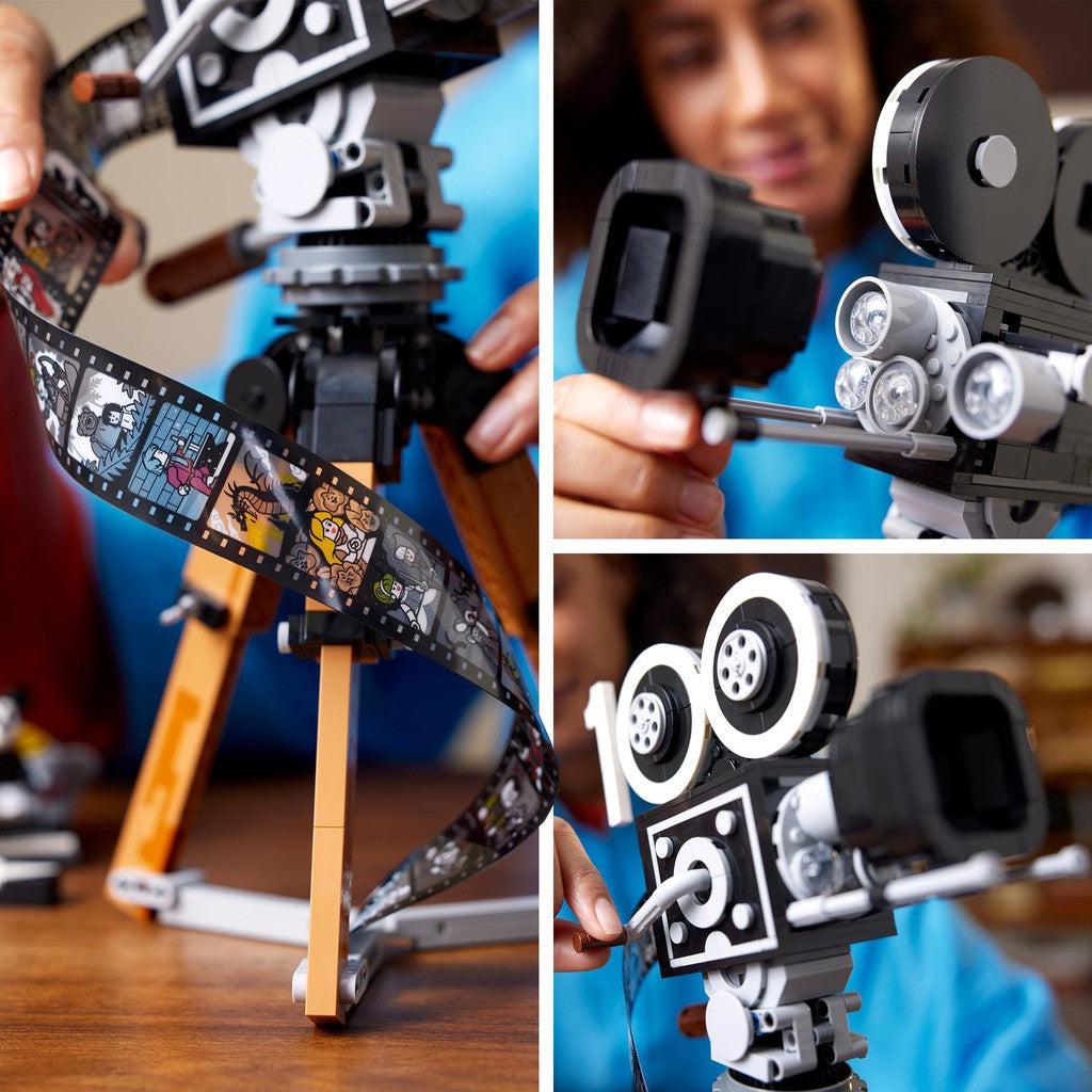 This image shows a man building the LEGO camera, and then spinning the crank to feed the film into thte camera