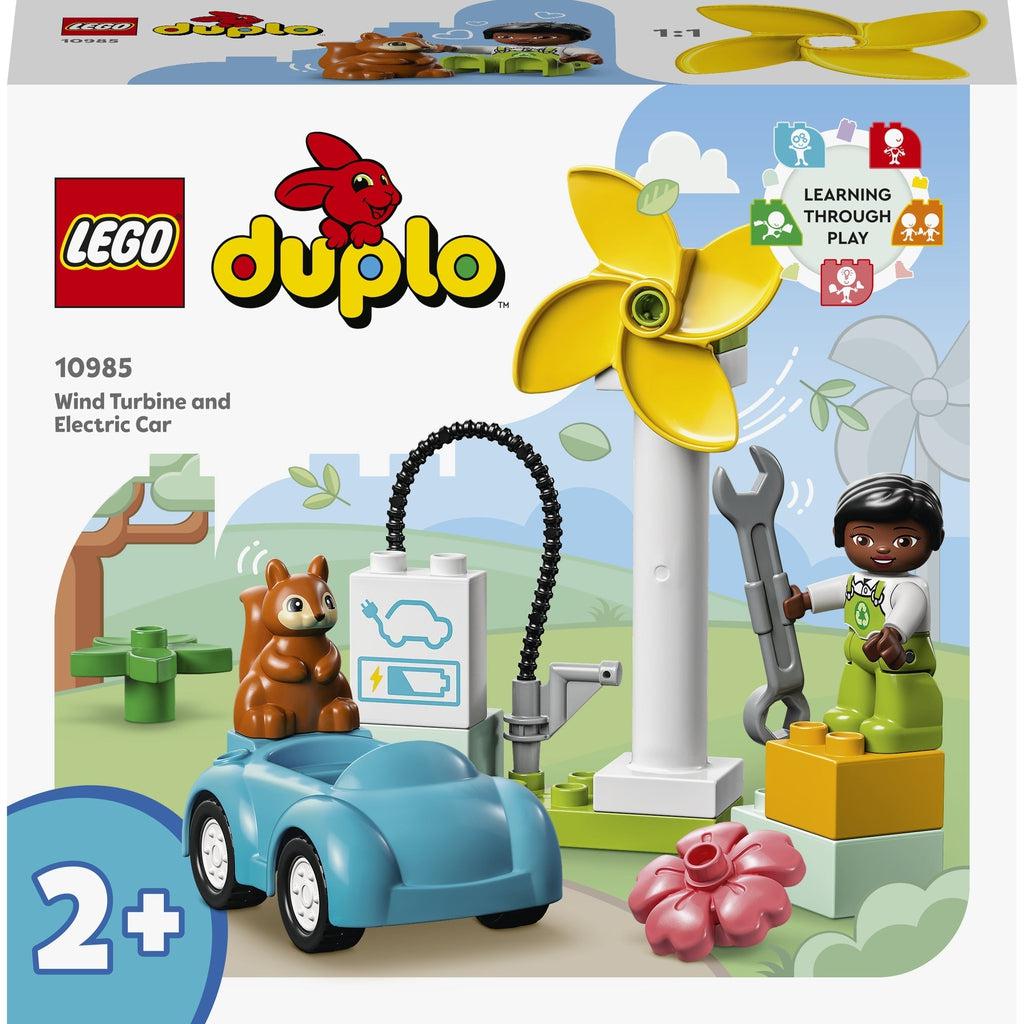 front of box shows the girl minifig with a wrench next to the turbine, car, charging station, and a squirrel figure standing on the car