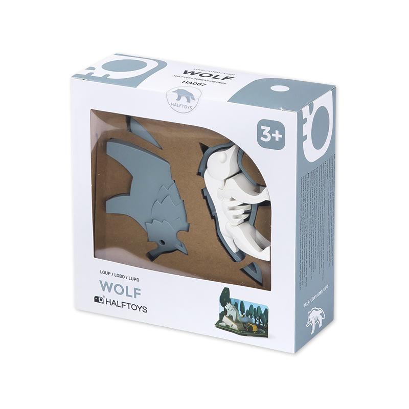 Image of the packaging for the Wolf and Forest Scene figurine toy. Part of the front is made from clear plastic so you can see the toy inside.