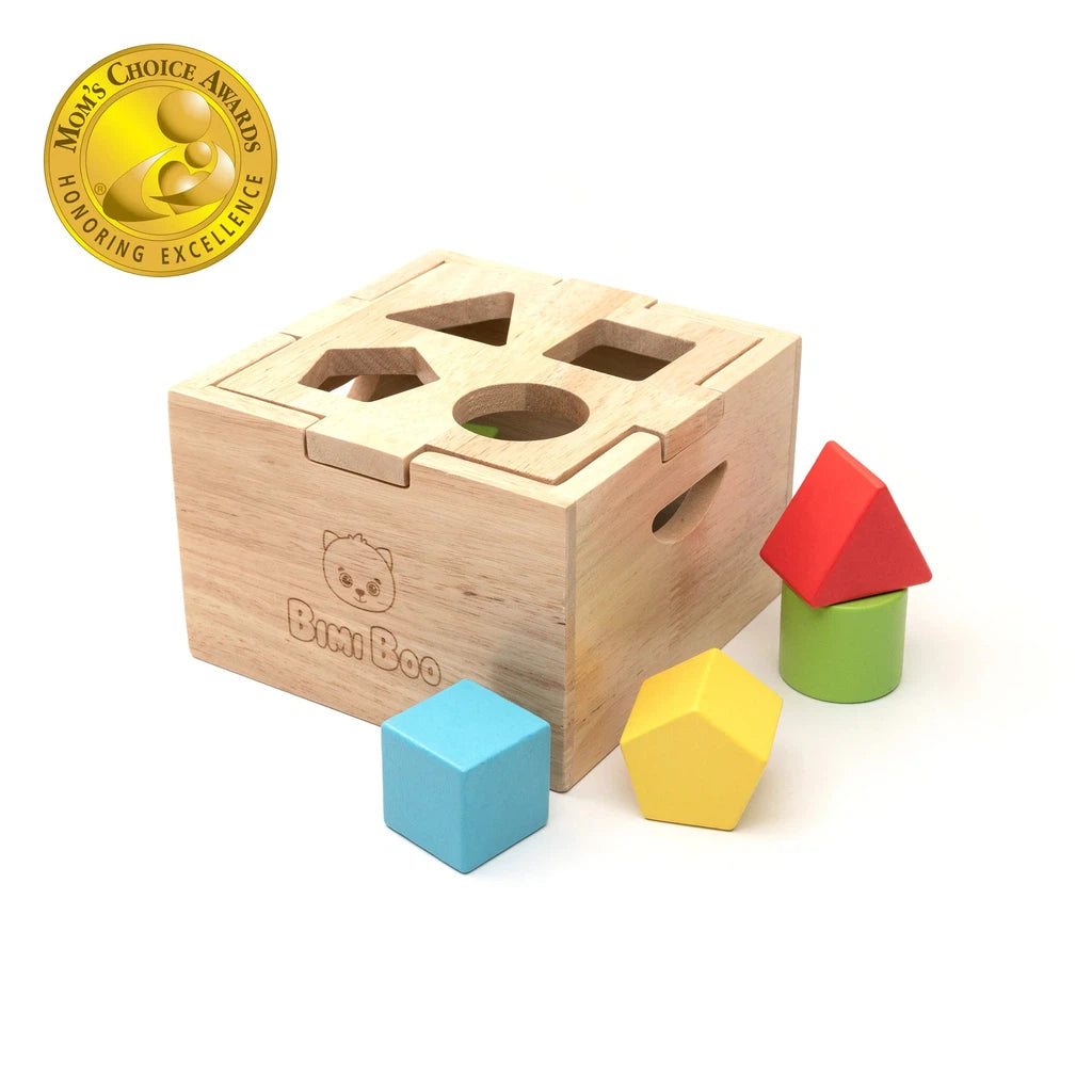 baby wooden blocks with blocks. there is a blue, yellow, green and red block