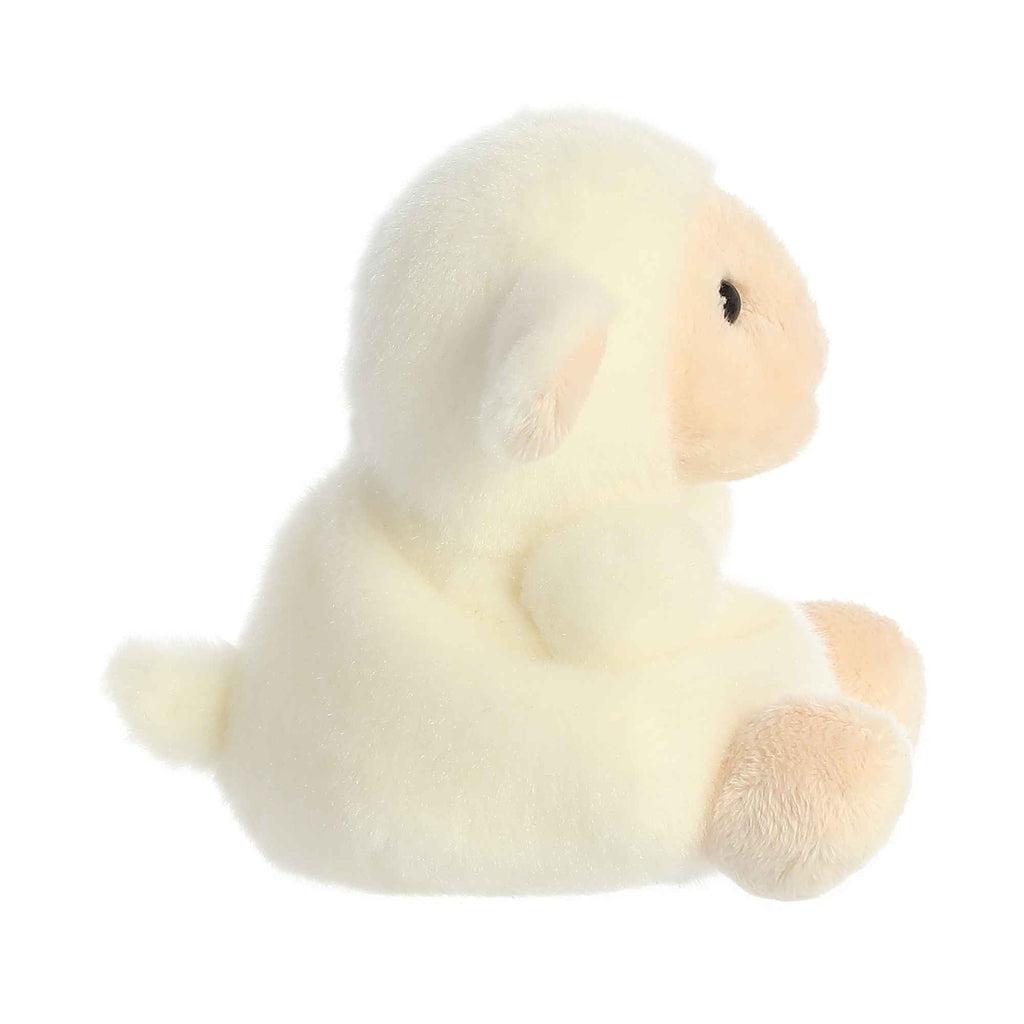 Side view of the lamb plush. From this angle you can see that she has a small tail in the back.