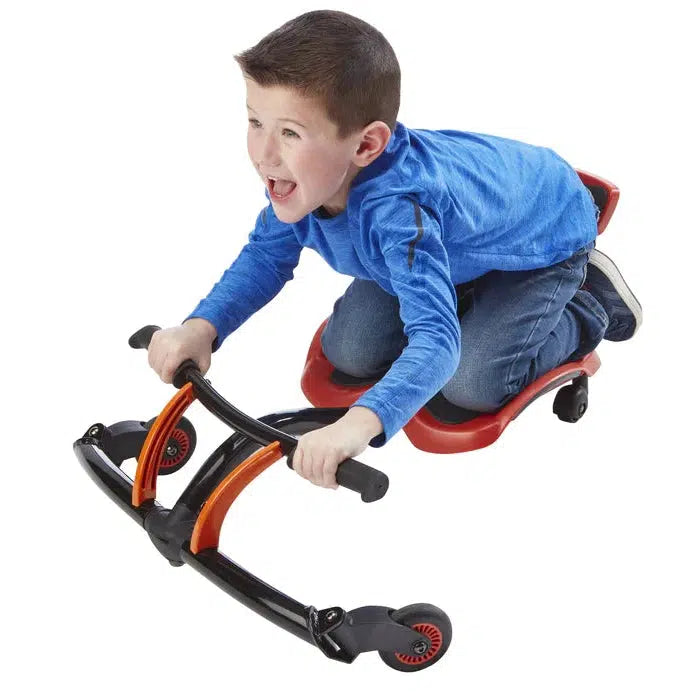 the image shows a child kneeling and using the front handles to steer the YBIKE
