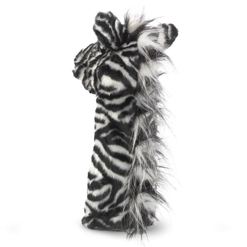 Back view of puppet | Backside of puppet shows a fluffy, short, black and white mane that runs the length of the body of the puppet.