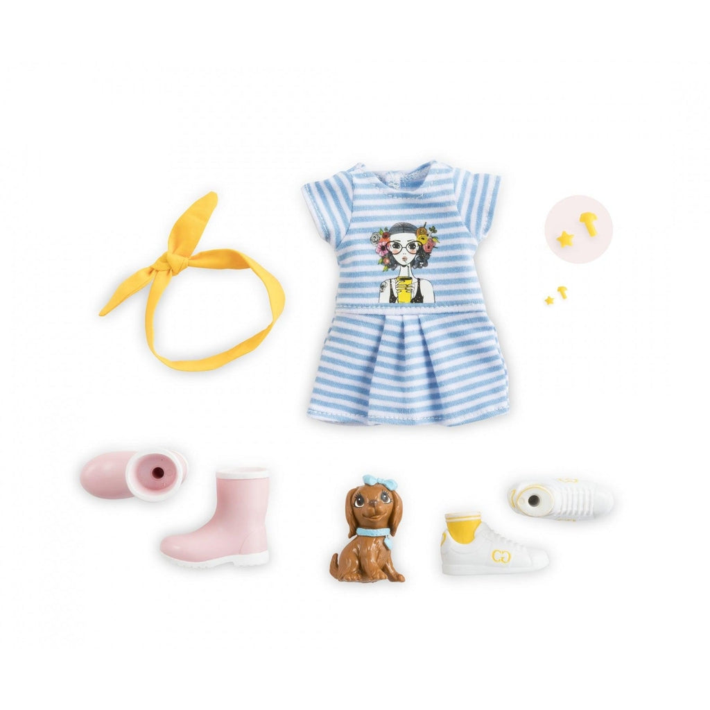 Image of all the included pieces. It comes with a blue dress, a yellow headband, two pairs of shoes, a dog, and yellow star-shaped earrings.