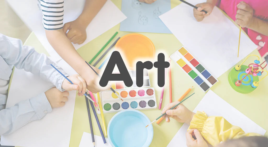 Art - table full or art supplies and children creating art
