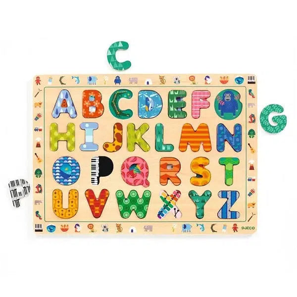 Image of the ABC international wooden puzzle. Each letter has a different pattern on it corresponding to an object that starts with the same letter.