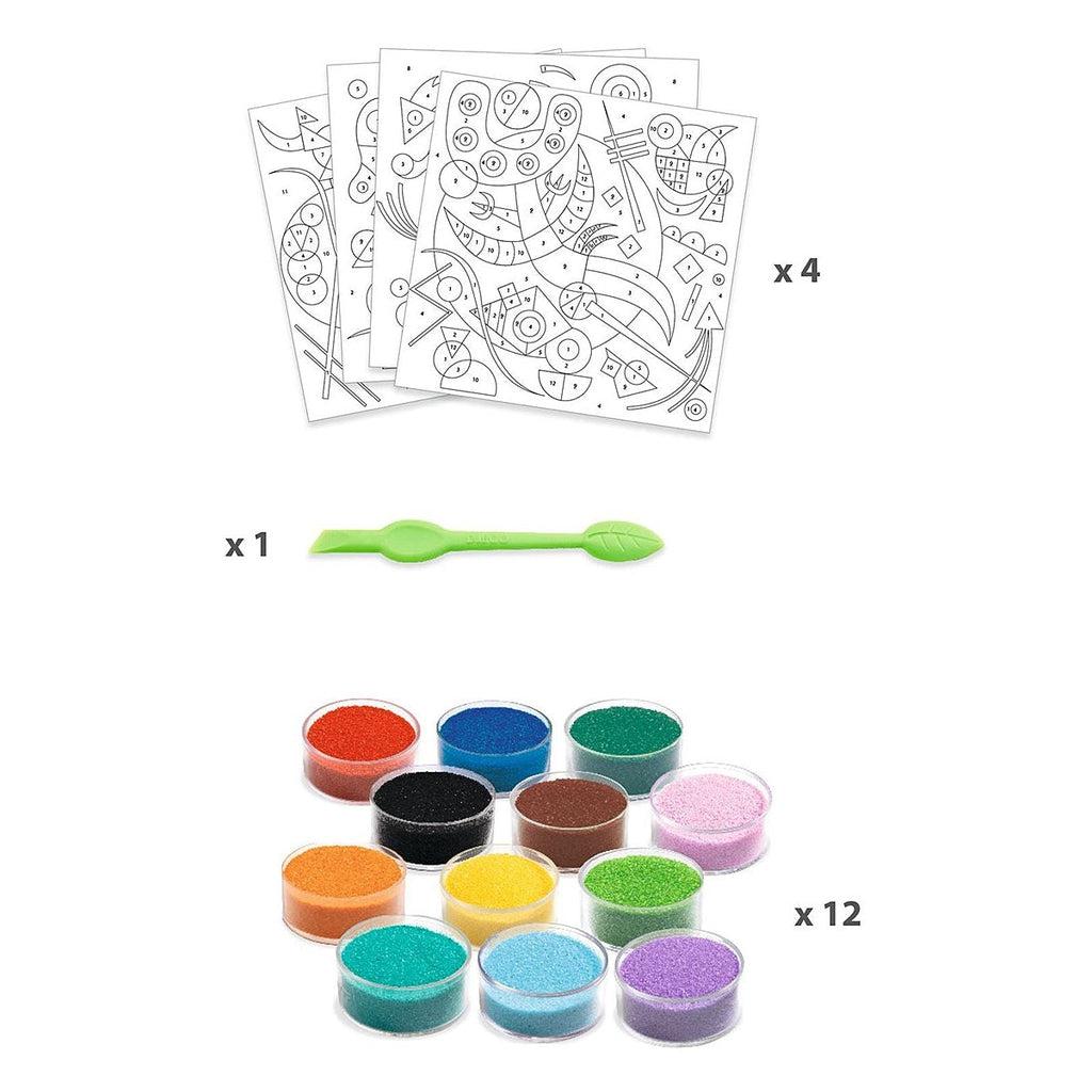 Image shows the included pieces for the craft kit. It includes four different pictures with numbers instructing which color to place where, twelve different colored sands, and a peeling tool.