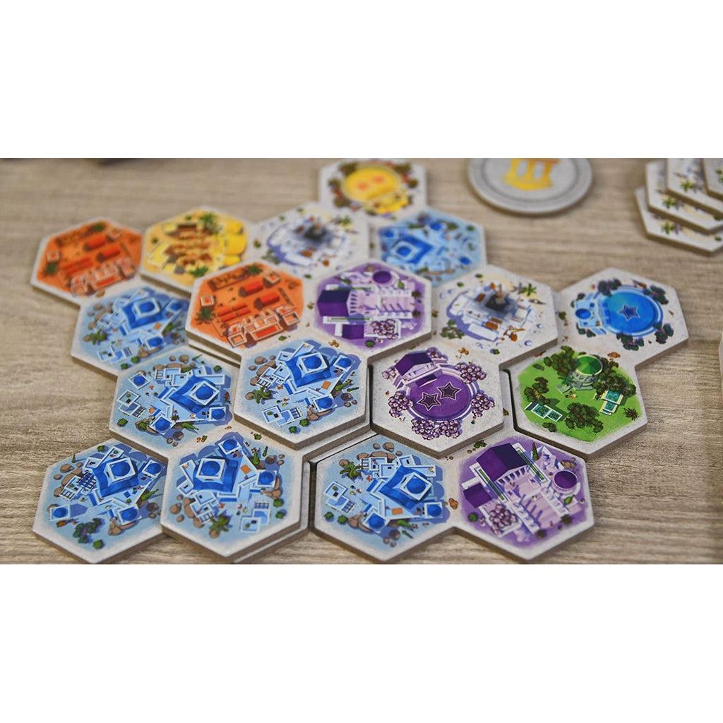 Close up of tiles | Tiles are hexagonal and have a variety of colors and illustrations.