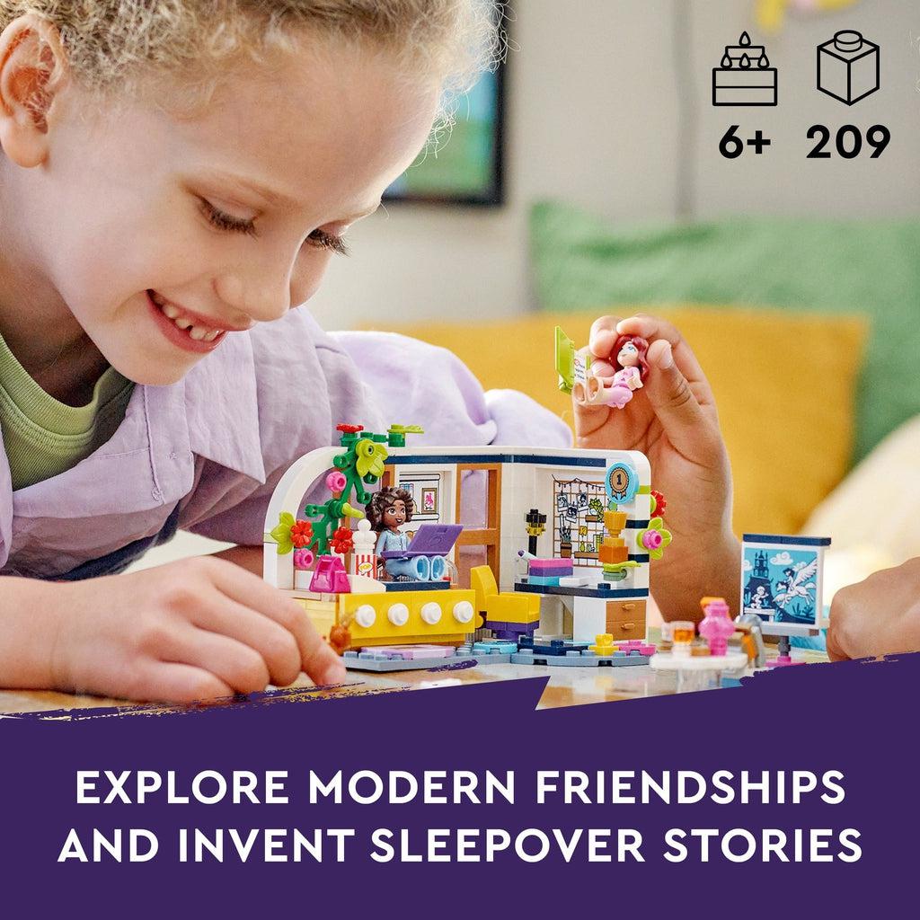 a girl is shown playing with the lego set | piece count of 209 and age recommendation of 6+ in top right | Image reads: explore modern friendships and invent sleepover stories.