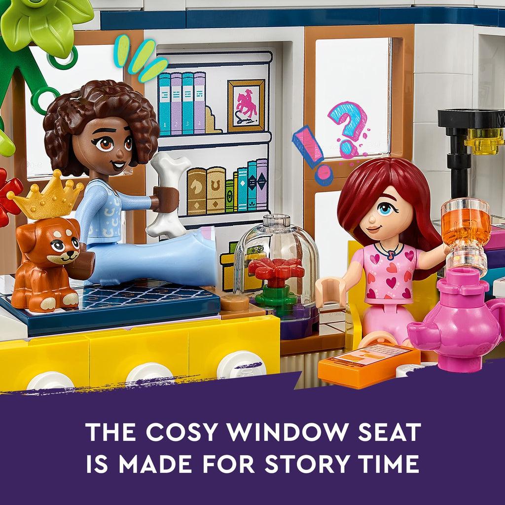 image shows the two characters in the room with the dog as well | image reads: the cosy window seat is made for story time.