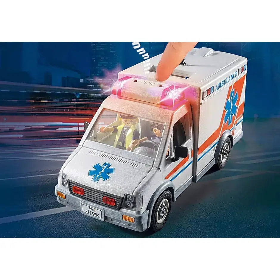 A finger presses the button on top of the ambulance causing the siren to lite up and text streams out of the siren to imply the noise that the toy actually makes