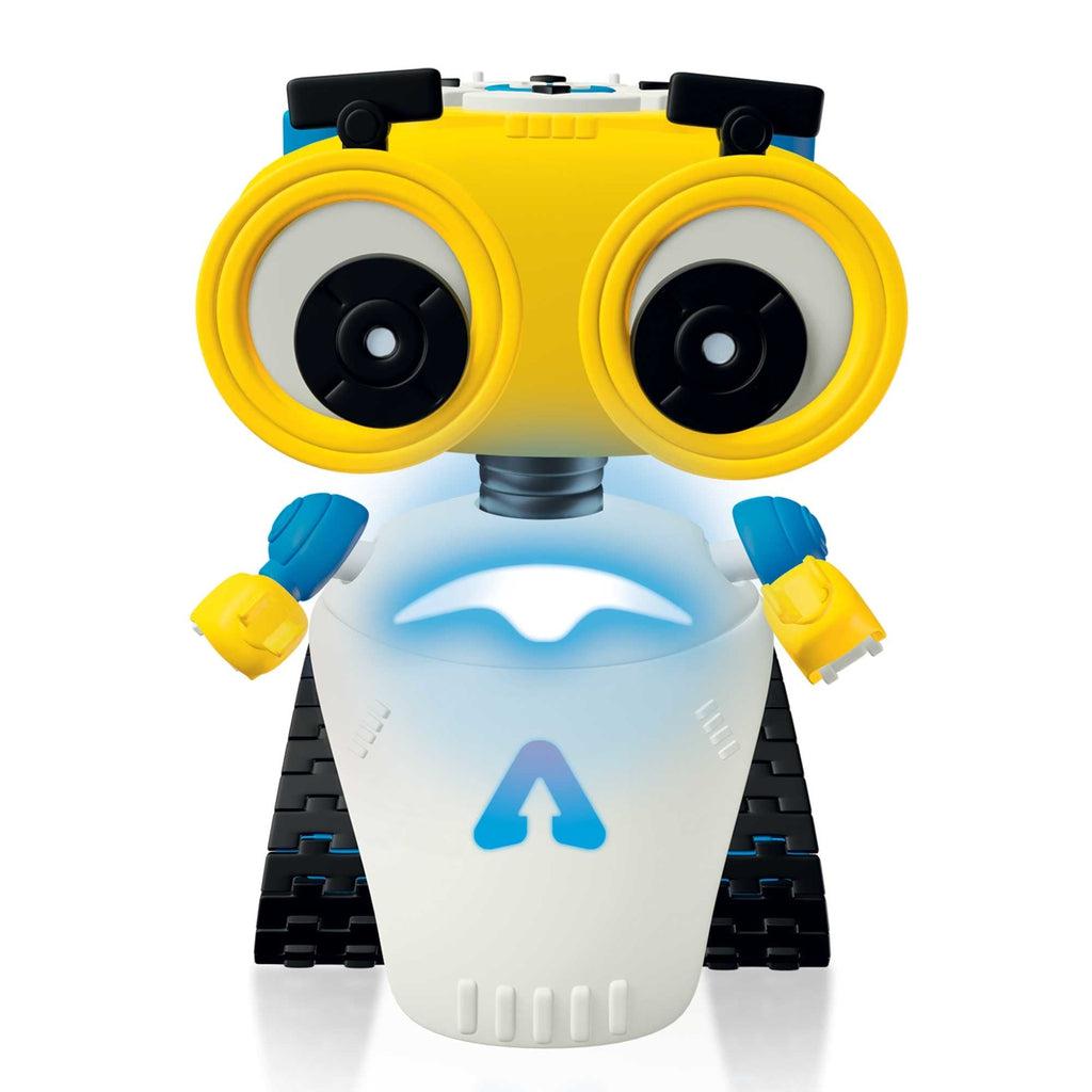 Robot out of packaging | The robot has a white body with black treaded wheels and small yellow and blue arms. It has a yellow head with two large eyes. | On top of the head is the programming buttons.