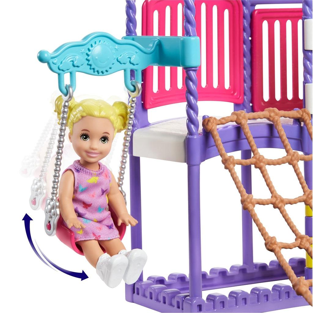 Shows the small child doll swinging on the attached swing.