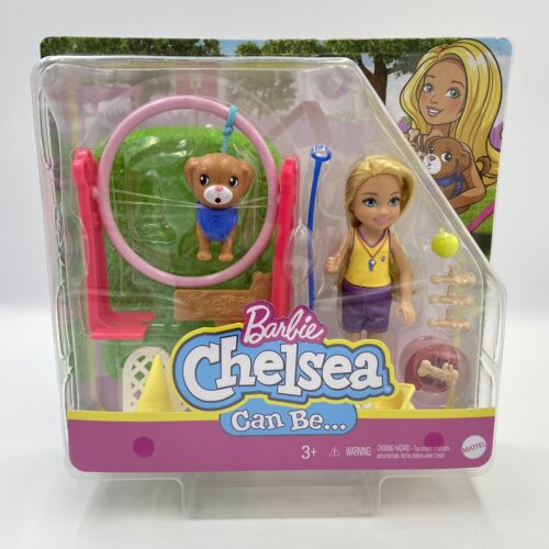 Image of the packaging for the Barbie Chelsea Can Be Dog Trainer Set. The front is made from clear plastic so you can see the included pieces inside.