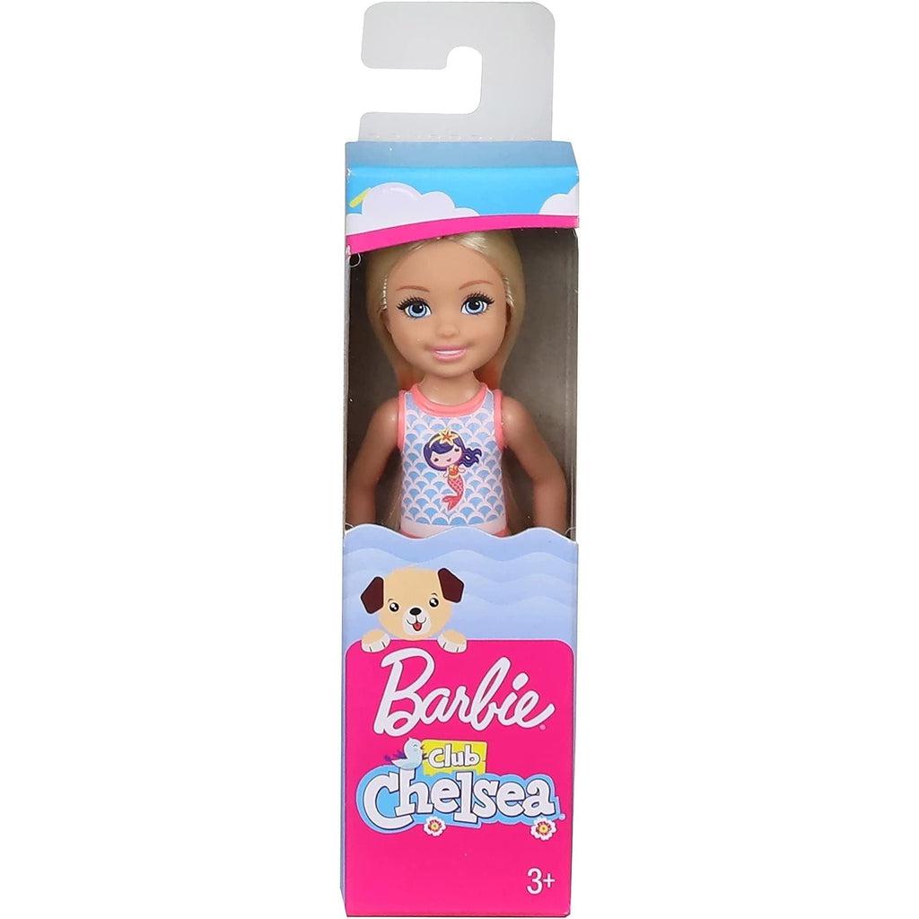 The chelsea doll is shown in it's plastic box packaging, The front reads: Barbie - Club chelsea, and has a graphic of a dog on it.