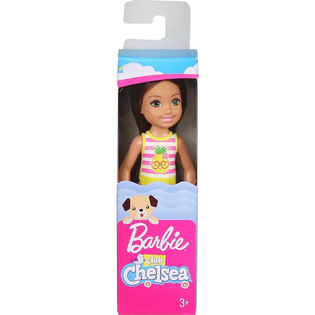 The chelsea doll is shown in it's plastic box packaging. The front of the box has the barbie logo, club chelsea, and a graphic of a dog
