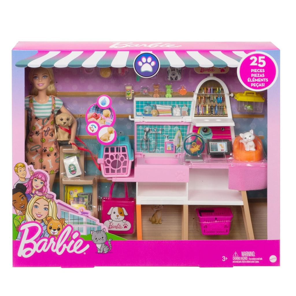 Image of the packaging for the Barbie Pet Boutique Play Set. The front is made of clear plastic so that you can see all the included pieces inside.