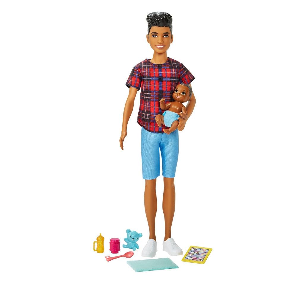 Doll 4 | This male doll has black hair that is long on top and short on the sides, hazel eyes, and a medium tone. He is wearing a red plaid shirt, blue shorts, and white sneakers. His accessories include a dark haired baby with a blue diaper, a toy bear, bottle, baby food, spoon, blanket, and checklist.