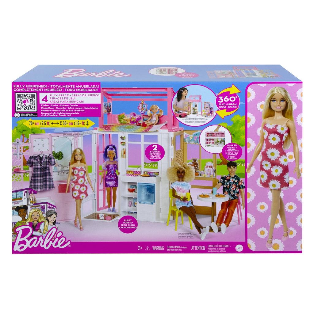 Image of the packaging for the Barbie Travel Dollhouse. The box has an image of the doll house with Barbie and her friends having fun.