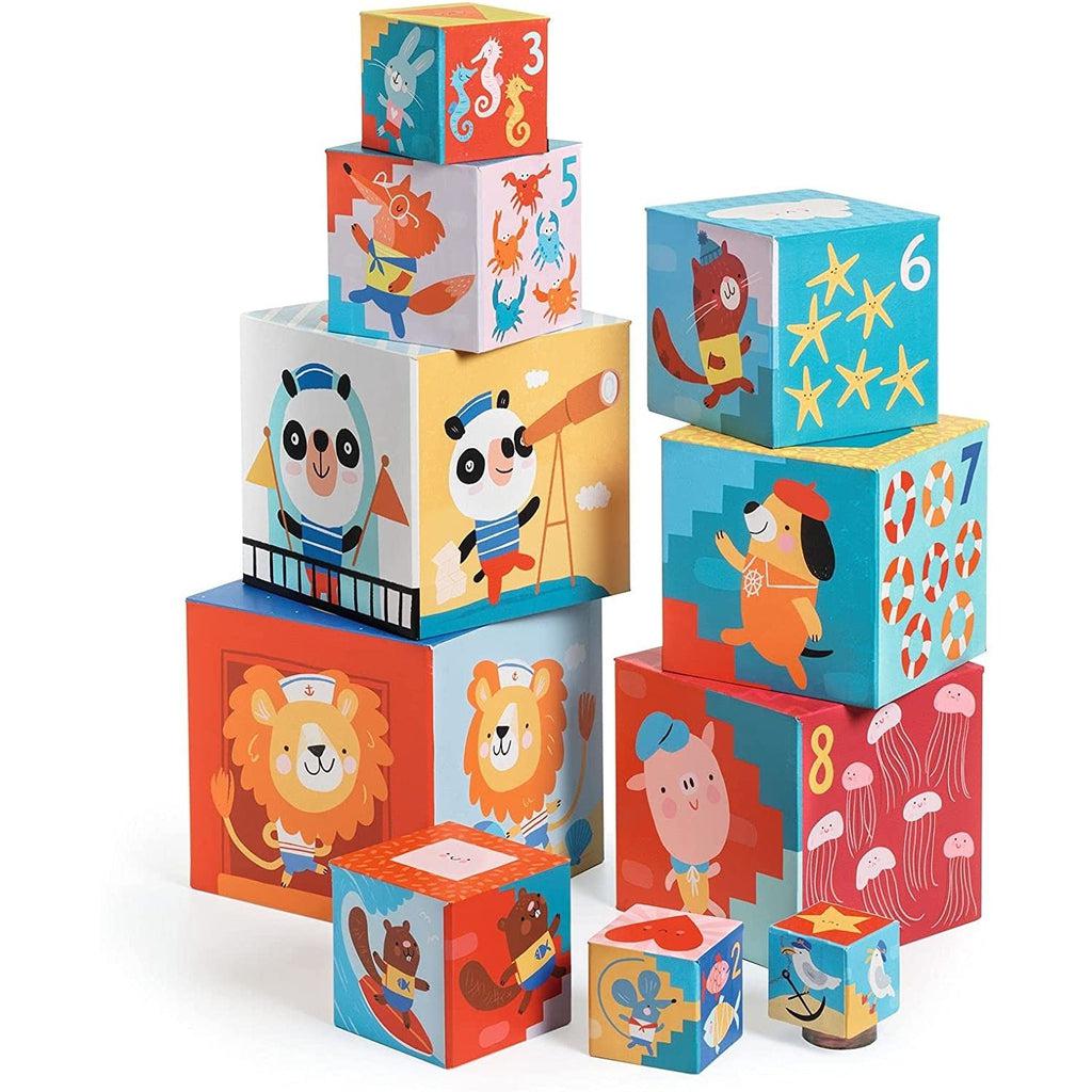 Image of the blocks outside of the packaging. Each block has a different animal on it completing a different occupation for example, a sailor lion and a surfer squirrel.