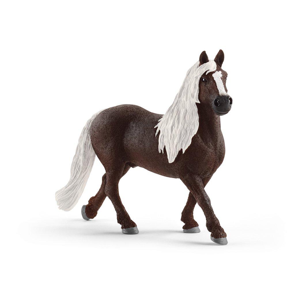 Image of the Black Forest Stallion figurine. It is a very dark brown with a white mane and tail. It has a white strip on its forehead and nose.