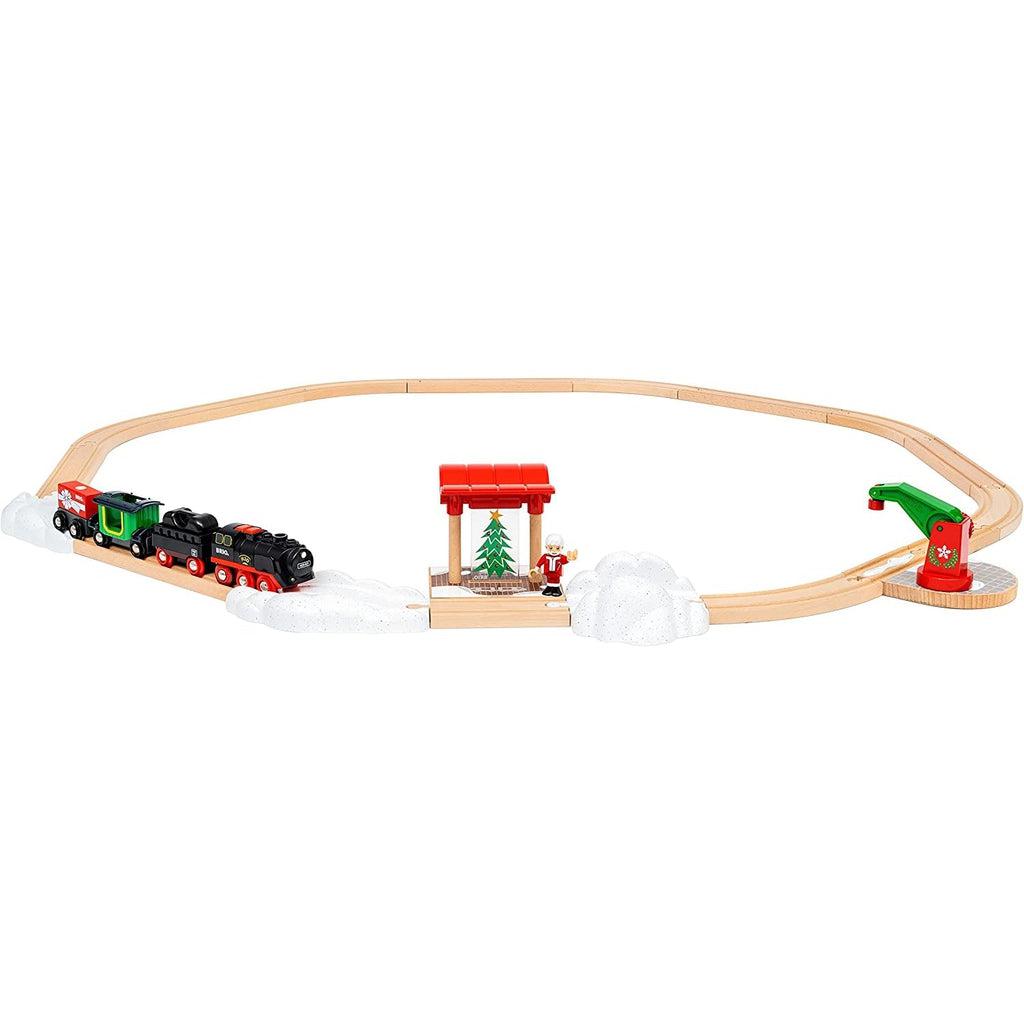 Displays the fully put-together set. Has the tracks, the train, the Christmas tree, the crane, and of course, Santa.