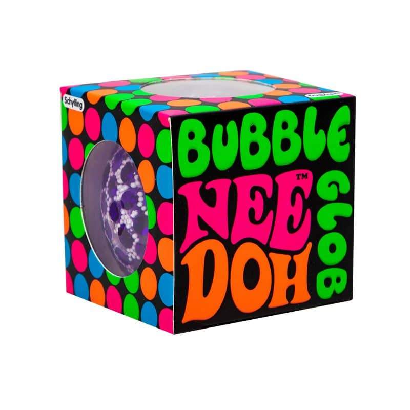 The box is covered in colorful dots with a hole showing the needoh inside on the top and sides. The name is printed on the front