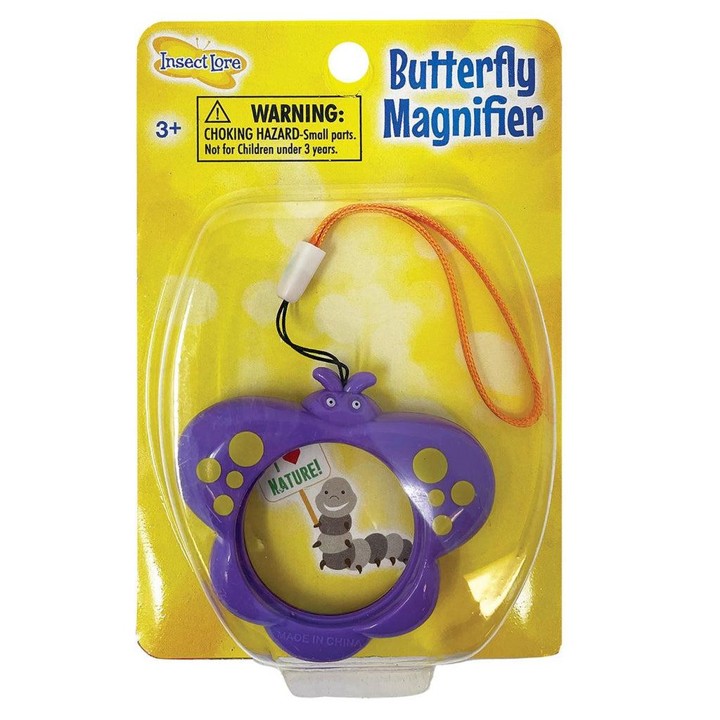 The butterfly magnifier is a magnifying glass surrounded by stylized plastic with wings and a little butterfly head. The head also has a wrist strap attached to it for children.