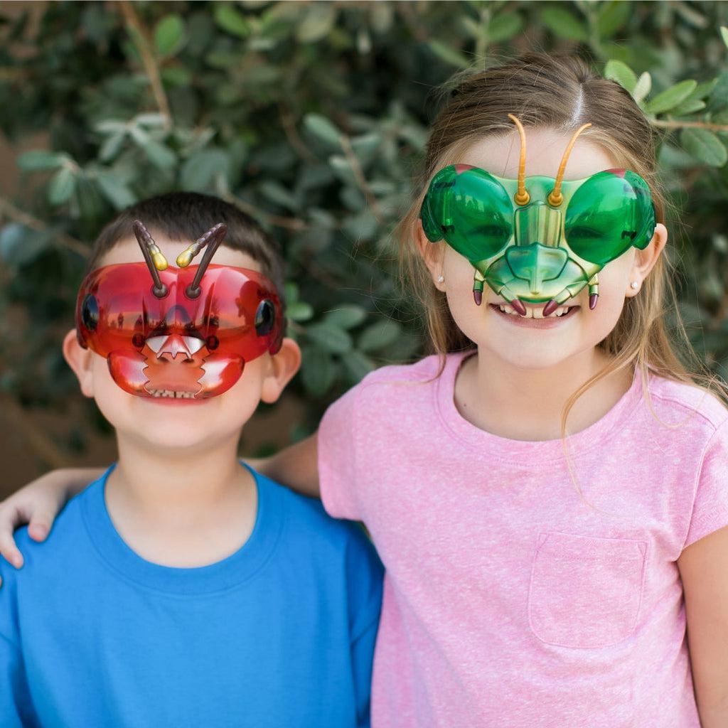 Scene of a brother and a sister wearing Buzzerks goggles and smiling.